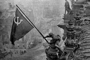 Raising a flag over the Reichstag 2.jpg